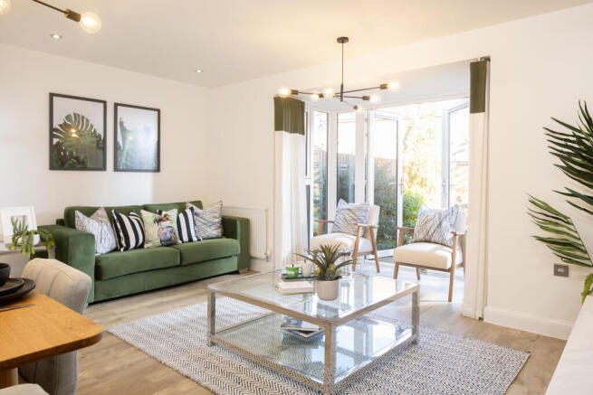 Lounge with French doors in the Woodcote 4 bedroom home