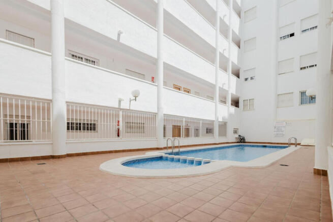 Torrevieja top floor apartment with pool and close to amenities