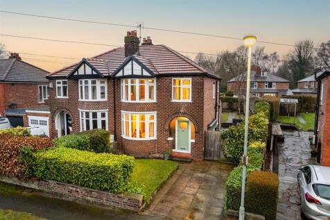 A Charming & Extended Family Home, Nestled Into a Quiet Pocket of Hartford