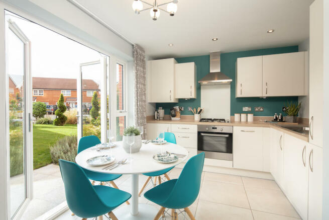 Open plan kitchen and dining area in the Roseberry, a 2 bedroom home at Madgwick Park Chichester