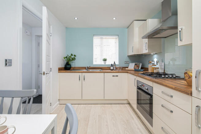 Kitchen with dining area in the Weaver 3 bedroom home