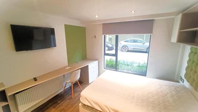 Bed and desk area