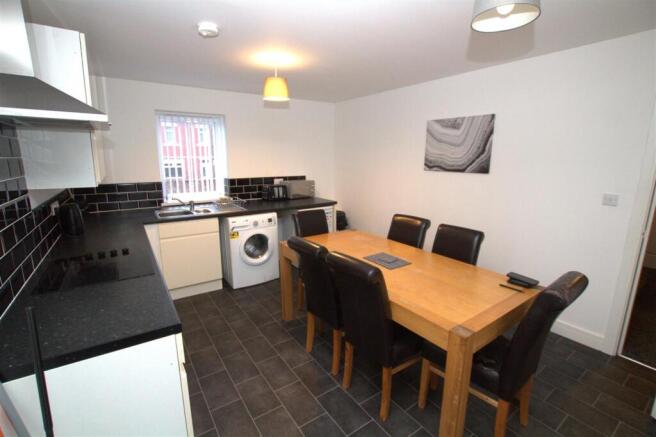 KITCHEN DINER REVERSE ANGLE.jpg