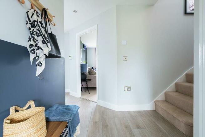 A welcoming hallway with space for storage