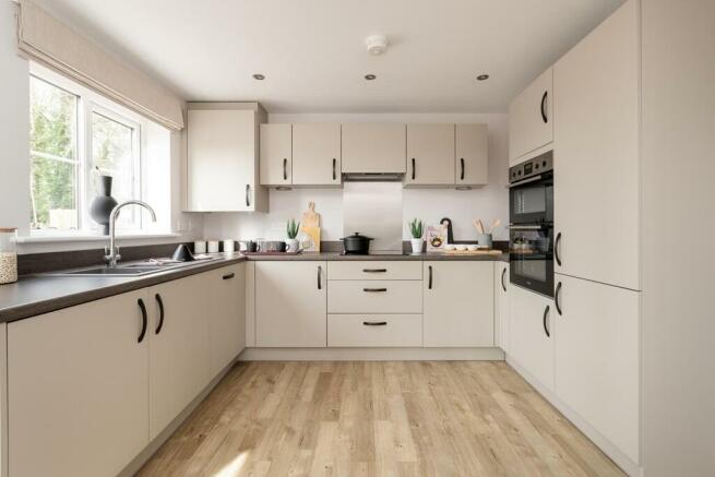 Modern 3-sided kitchen with ample storage space