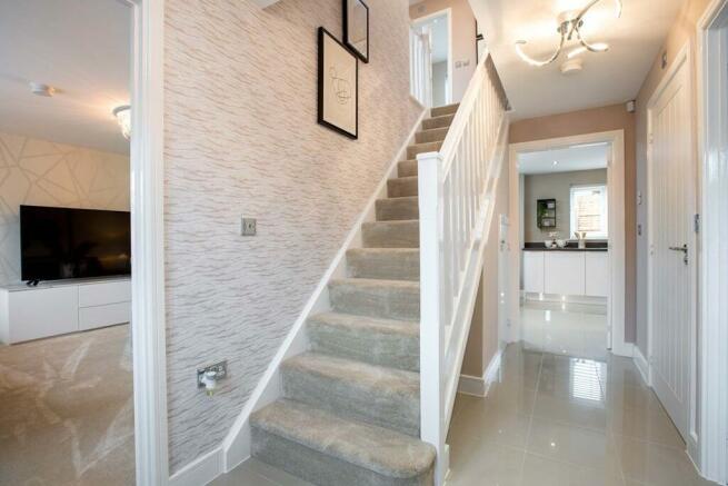 Hallway with under stairs storage