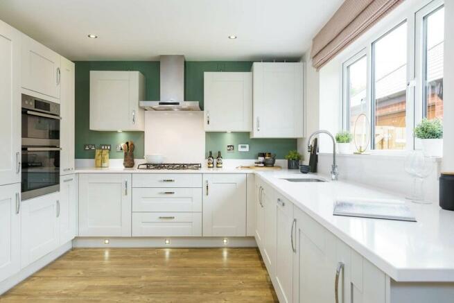 The bright and airy kitchen is the perfect place to entertain family and friends
