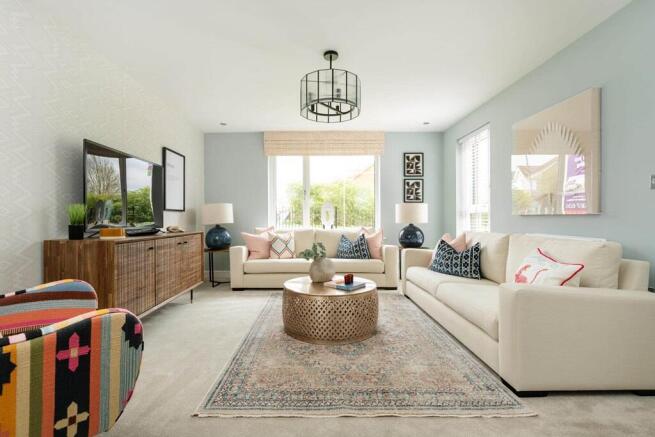 A bright and airy lounge offers space to unwind with the family