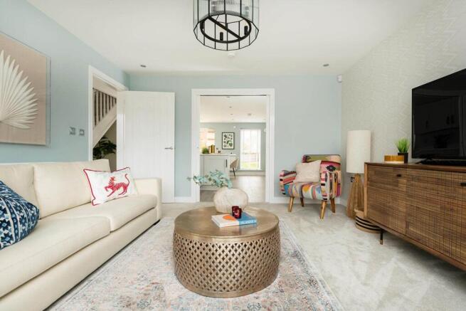 The lounge leads through to the kitchen