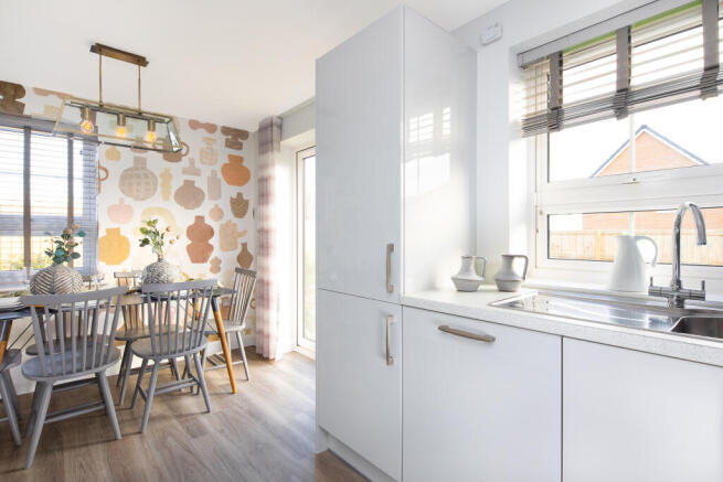 Open plan kitchen with dining area in the Moresby 3 bedroom home