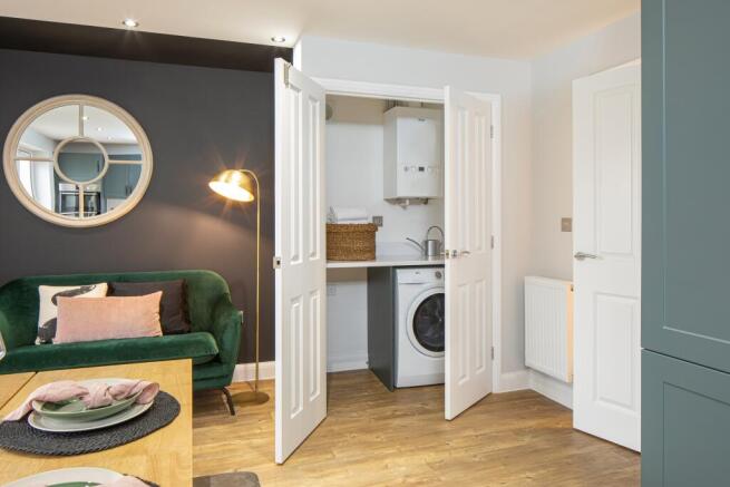 Separate utility cupboard in the Ingleby 4 bedroom home