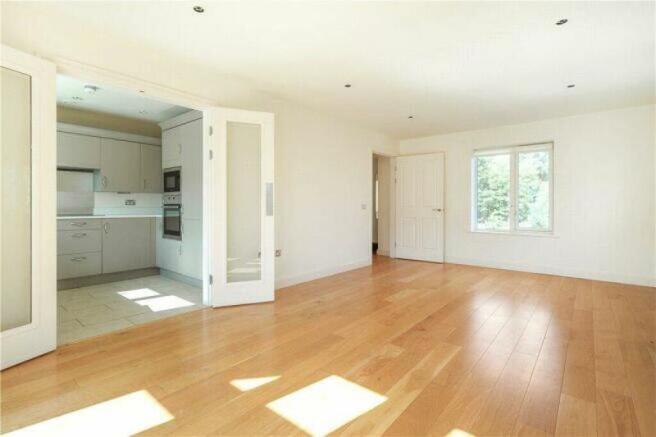 LIVING/DINING ROOM WITH BALCONY ACCESS