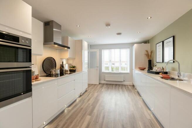 Beautifully designed kitchen with ample storage space