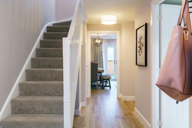 The Chelbury has a spacious hallway with under stair storage