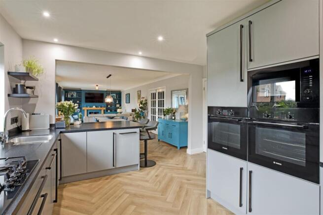 KITCHEN THROUGH TO DINING ROOM