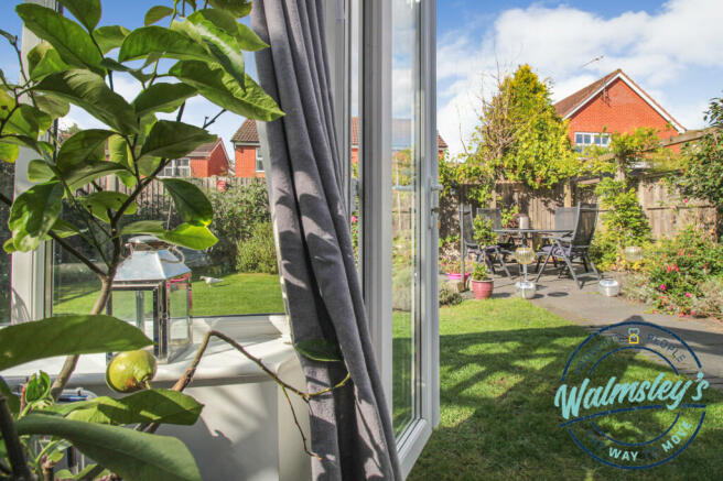 Conservatory with French doors to garden