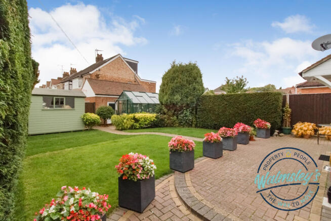 Rear gardens towards garage & driveway
