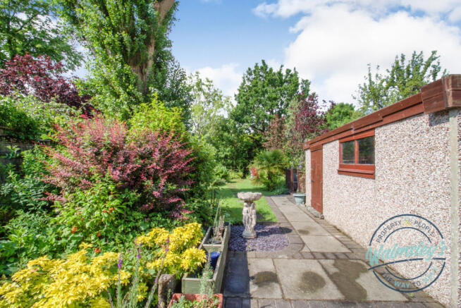 Garage & beautiful gardens