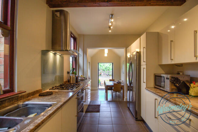 Kitchen with extension beyond