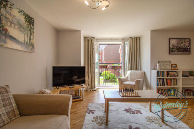 Sitting room & French doors to Juliet Balcony