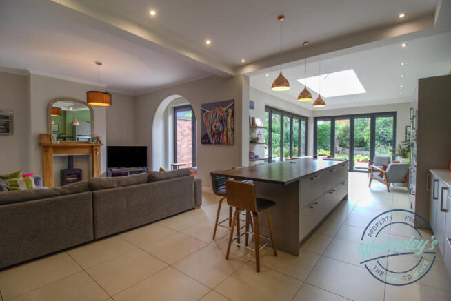 Open plan kitchen dining & family room with underf