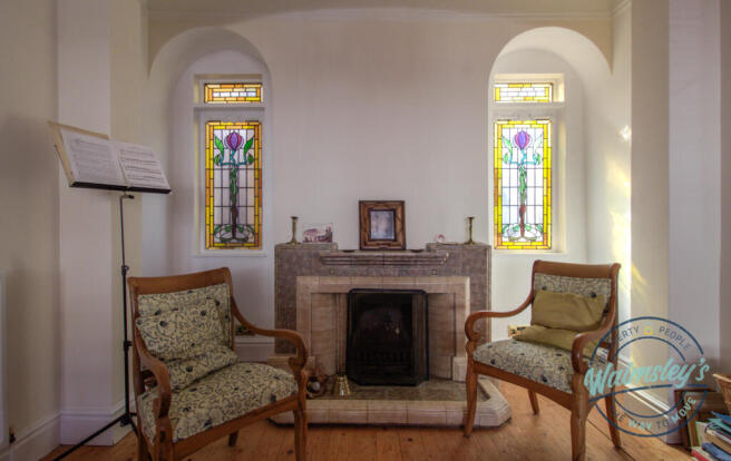 Stunning fireplace and Stained glass side panels