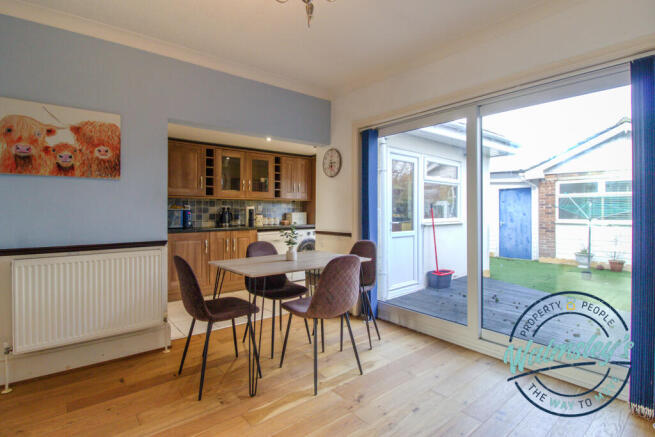 Dining room with kitchen beyond
