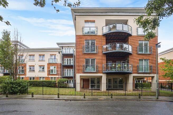 FRONT OF APARTMENT BUILDING