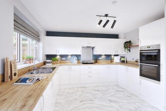 The kitchen features ample storage and counter space