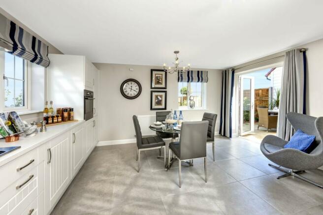 open-plan kitchen diner leading to garden