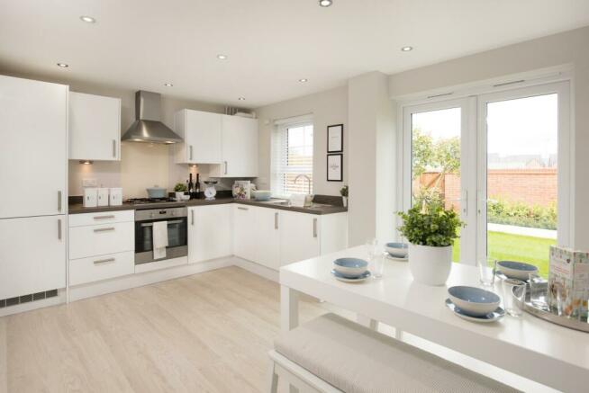 internal shot of Moresby kitchen with French doors to garden