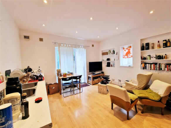 A ground floor 2 bedroom 2 bathroom flat with a l