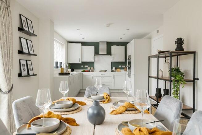 The large open plan kitchen/dining area is the hub of this family home