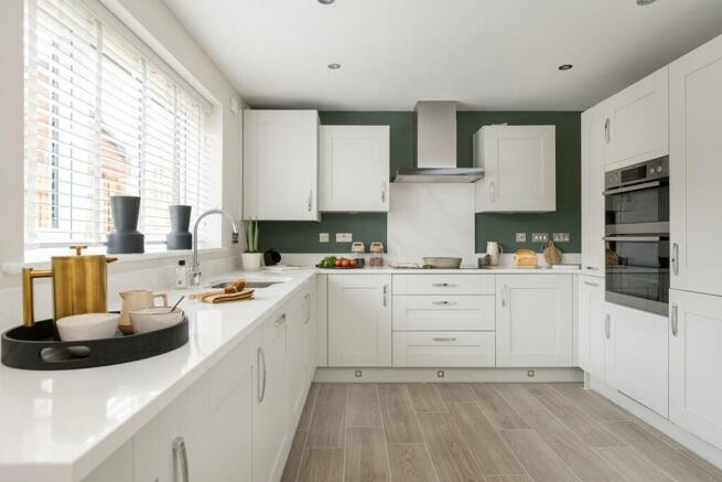 Beautifully designed kitchen with ample storage and worktop space