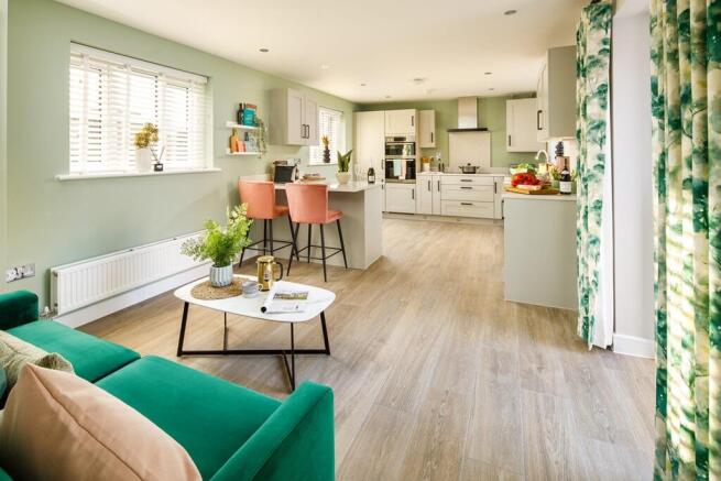 A large kitchen diner with French doors to the garden