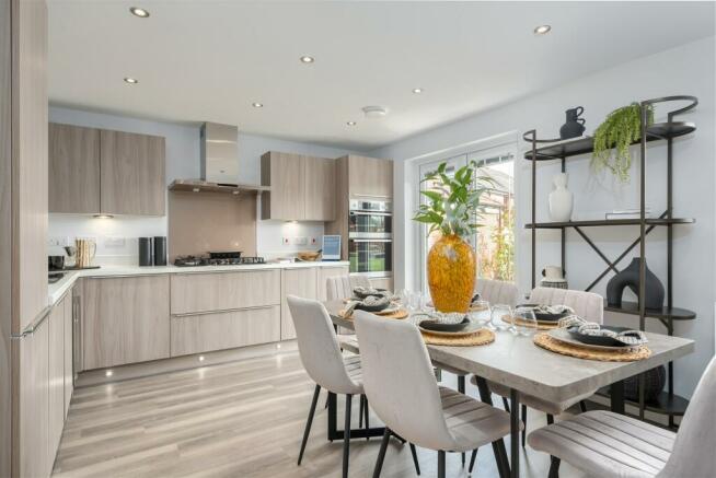 Inside view of the Ingleby open plan kitchen. 4 bedroom home.