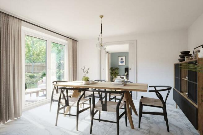 Family-friendly dining area with French doors to garden