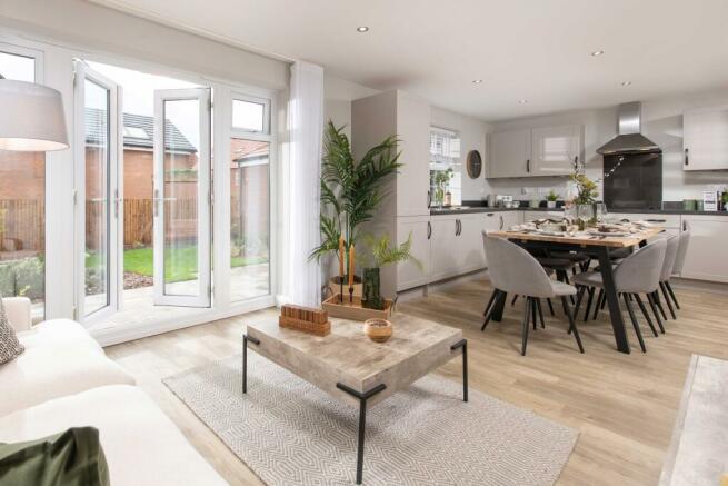 Open-plan kitchen with French doors in the four bedroom Kirkdale