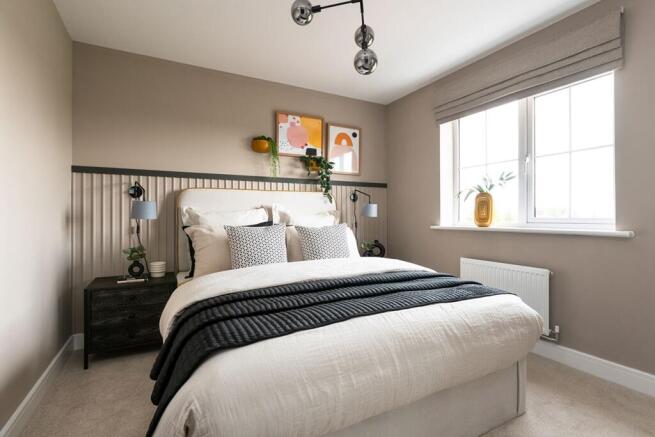 The luxurious main bedroom offers an idyllic place to relax