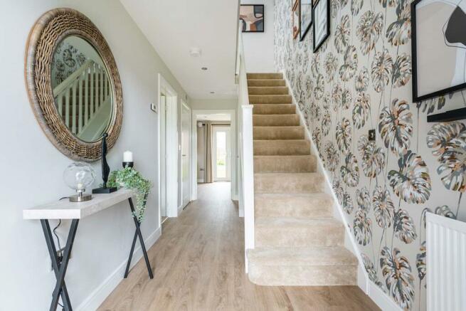 The light & airy entrance hall with hidden storage