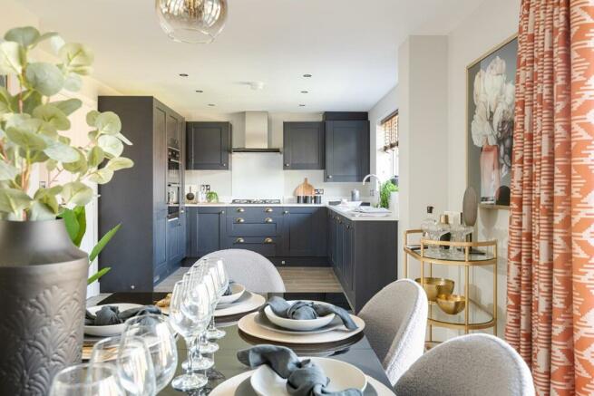 Light open plan kitchen/dining area - typical Taylor Wimpey home