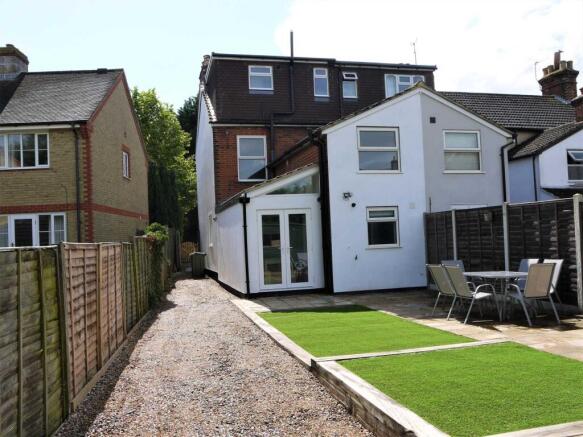 Well-presented exterior with a tidy paved pathw...