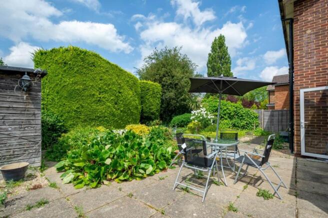 Sunny private rear garden with patio seating, m...