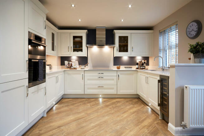 Open plan kitchen in the Holden 4 bedroom home