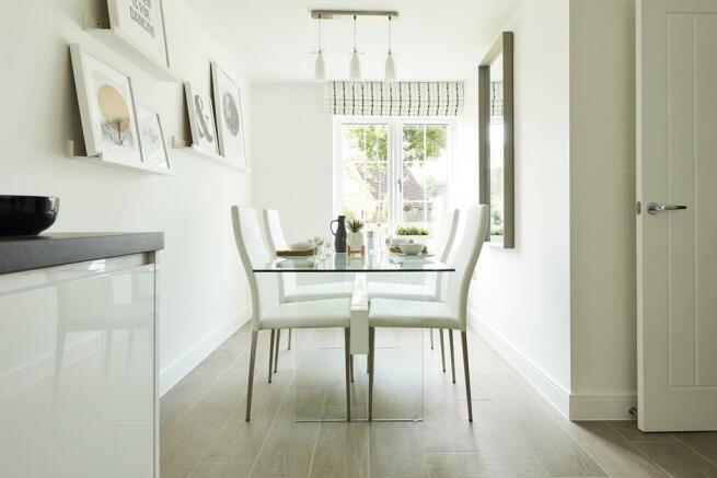 Enjoy meals with the family in the open plan kitchen-diner