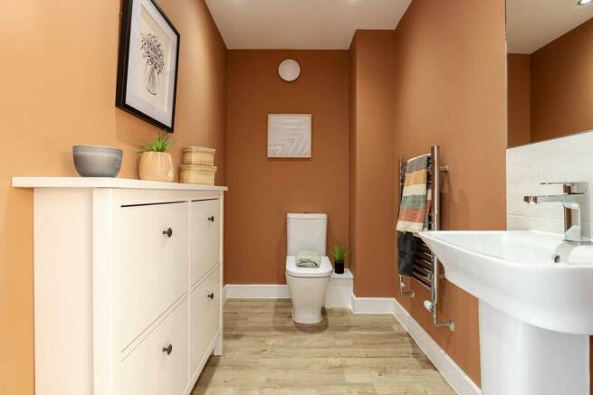 A cloakroom on the ground floor also has utility space