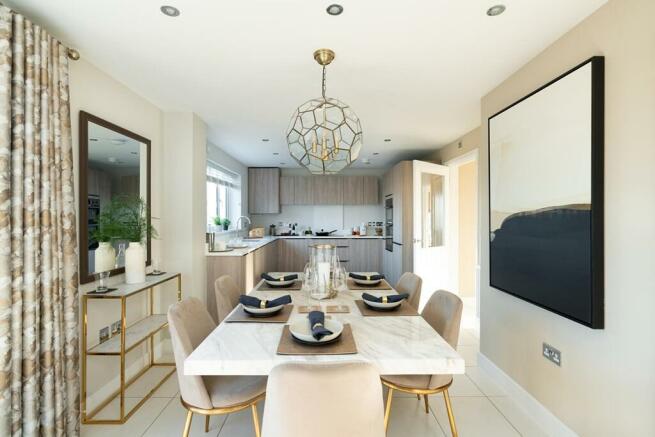 The large, open plan kitchen diner is the hub of the home