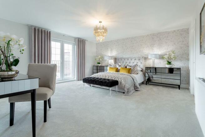 Main bedroom offers plenty of space & enjoys a private dressing room
