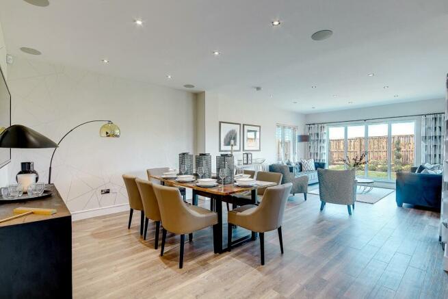 The bright garden room offers a superb social space