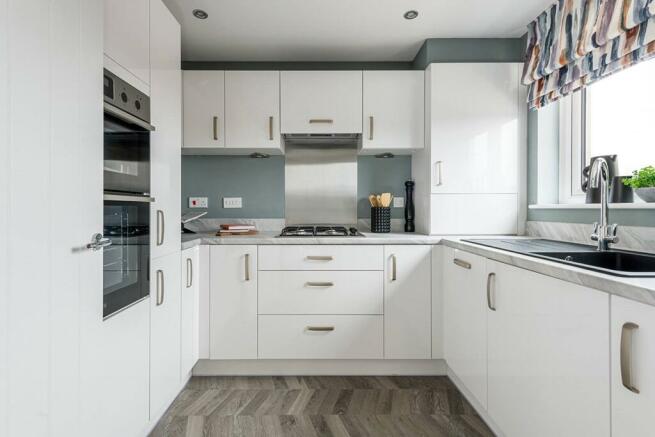 3 sided kitchen with plenty of storage space